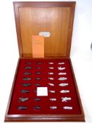 A cast pewter Camelot chess set by Royal Selangor in teak box