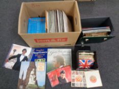 Two cases and a box of vinyl LP's and seven inch singles,