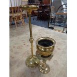 A 19th century brass plant stand together with brass trivet and planter on paw feet