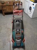 A Bosch Rotak 430 electric lawn mower with grass box and lead