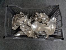 A box of stainless steel sauce boats