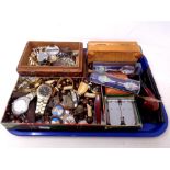A tray of wristwatches, pen knife, wooden crucifix on bead necklace, cast metal crucifix, pipe,