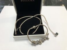 A Pandora silver charm bracelet and necklace