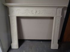 A painted late 19th century style fire surround,