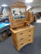 An Edwardian satinwood three drawer dressing chest