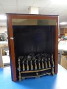 A coal effect electric fireplace by Woodcraft