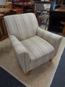 A Next armchair in striped fabric
