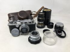 A Leica Ernst Leitz Wetzlar camera numbered 295,533, circa 1936,