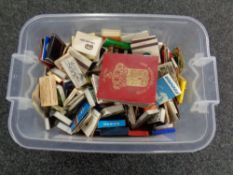 A crate of matchbooks and boxes