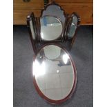 An Edwardian oval framed mirror together with a mahogany triple dressing table mirror (as found)