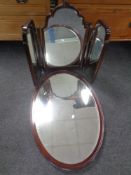An Edwardian oval framed mirror together with a mahogany triple dressing table mirror (as found)