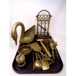 A tray of brass wares, swan planter, onyx and brass lighter, rocking horse,
