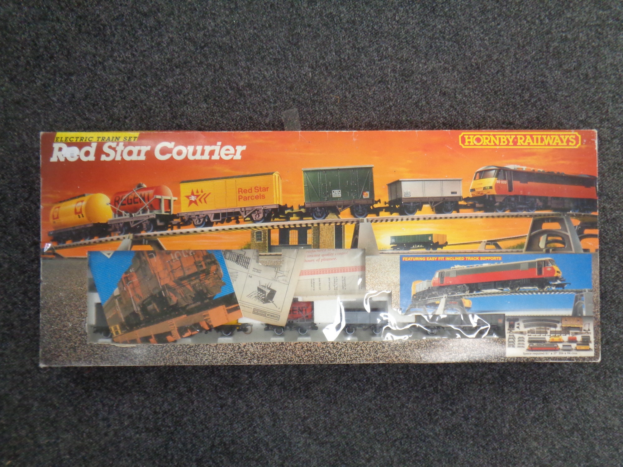 A Hornby Red Star Courier electric train set