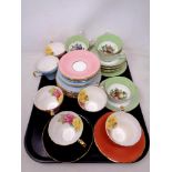 A tray of English bone china cups and saucers,
