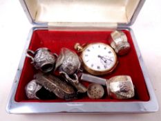 A box of plated pocket watch, silver salt and pepper pots, two silver whisky labels,