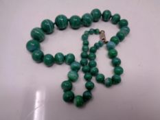 A polished green stone necklace