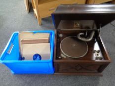 An oak cased HMV table top gramophone together with a box of 78's
