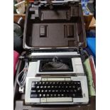 A Smith/Corona 2200 electric typewriter in case,
