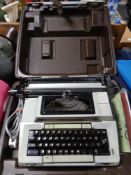 A Smith/Corona 2200 electric typewriter in case,
