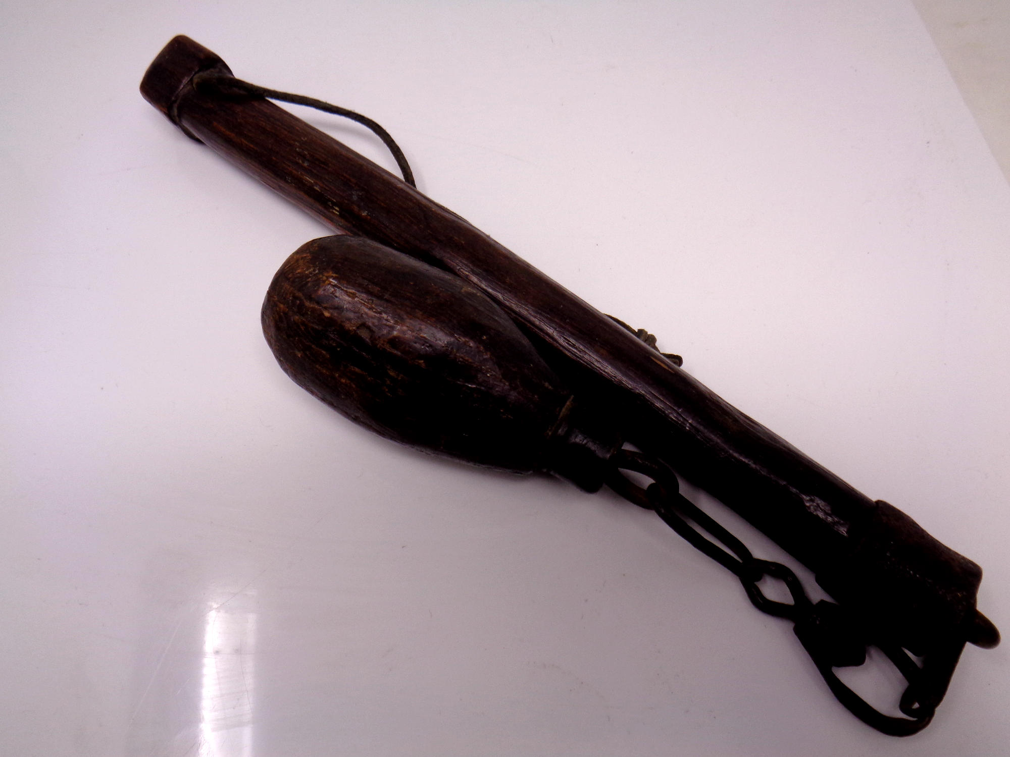 An early 19th century wood and iron farming tool, possibly for hay beating.