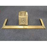 A 19th century brass embossed coal receiver together with a brass fire curb and copper & brass pot