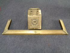 A 19th century brass embossed coal receiver together with a brass fire curb and copper & brass pot