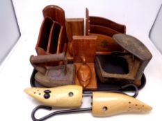 A tray of 19th century cast iron flat iron, cobbler's last, shoe stretchers,
