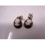 A pair of old cameo silver earrings