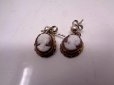 A pair of old cameo silver earrings