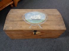 An antique pine dome topped painted shipping chest
