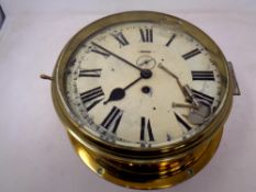 A brass cased ship's clock,