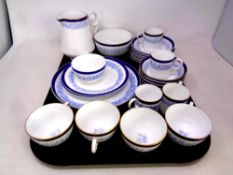 A tray of twenty six pieces of 19th century Royal Crown Derby blue and white rose pattern china