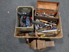 A box of power tools and hand tools,
