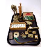 A tray of cigarette box, glass marbles, brass ware figure of a golfer, Hedgehog tap, dominoes,