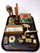 A tray of cigarette box, glass marbles, brass ware figure of a golfer, Hedgehog tap, dominoes,