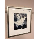 Kylie Minogue : A signed photograph, 22 cm x 20 cm,