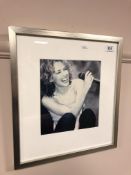 Kylie Minogue : A signed photograph, 22 cm x 20 cm,