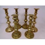 Three pairs of Victorian brass candlesticks