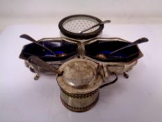 A pair of London silver salts with blue glass liners and spoons together with a further silver