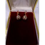 A pair of 9ct gold diamond drop earrings