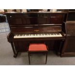 A mahogany cased overstrung piano by Kemble of London together with storage piano stool