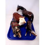 A tray of three Melba ware horse figures and a further Hereford bull figure