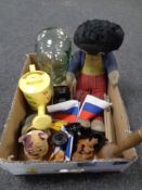 A box of vintage golly soft toy, glass head, flags on stands,