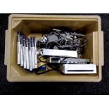 A crate containing Sony Play Station 2 with leads and controllers together with seven assorted