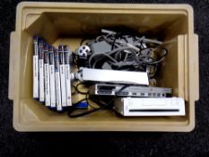 A crate containing Sony Play Station 2 with leads and controllers together with seven assorted
