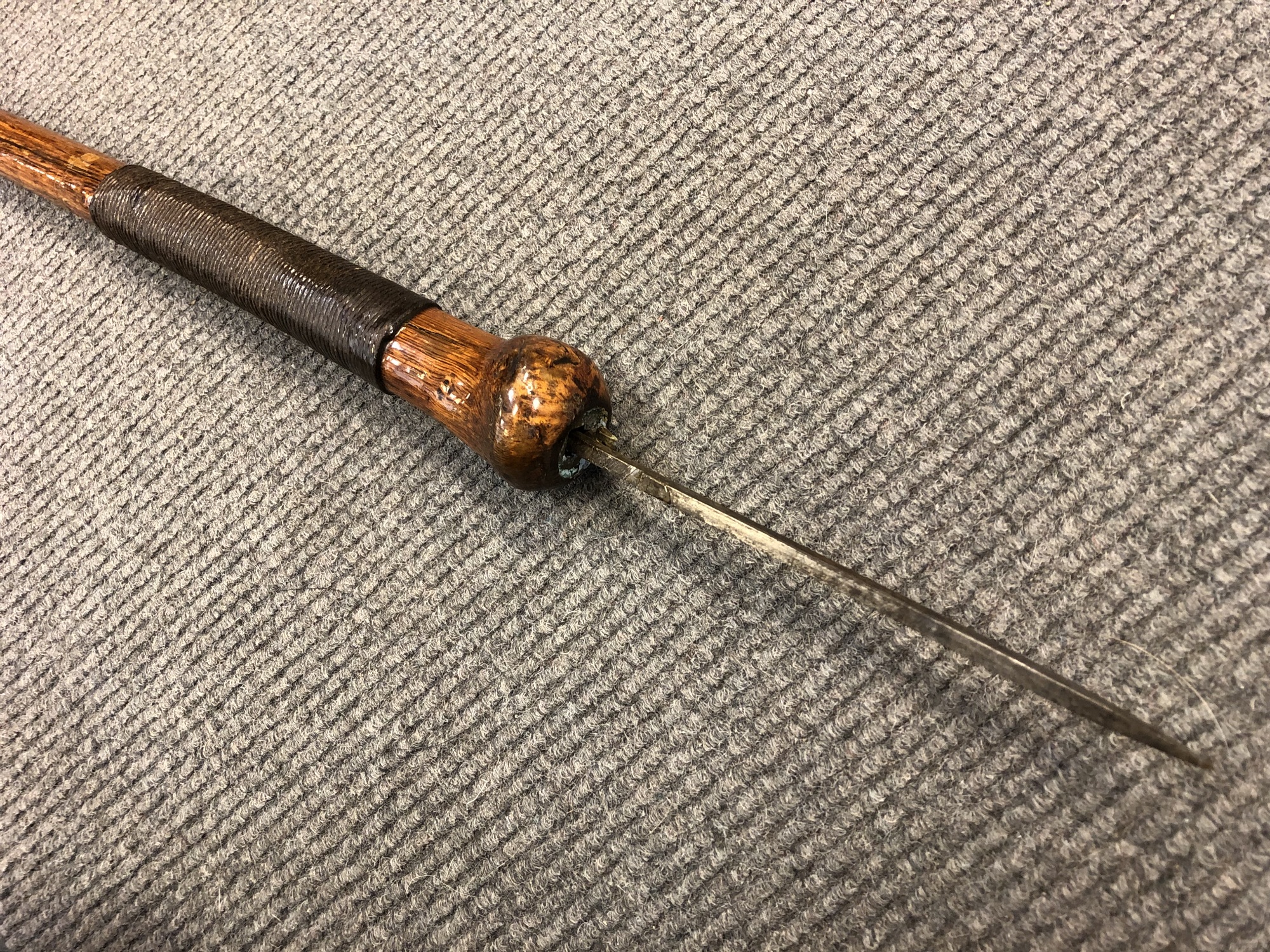 An early 20th century sword cane, with coin-inset pommel revealing a 15cm blade. - Image 3 of 3