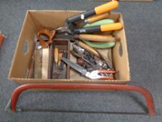 A box of hand tools, garden shears,
