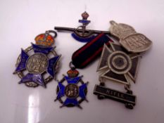 A silver ARP badge together with a silver and enameled Royal Navy bar brooch and three silver