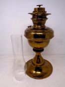 A 19th century brass oil lamp with chimney (as found)