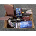 A box containing a quantity of compressor attachments, inspection lamp,